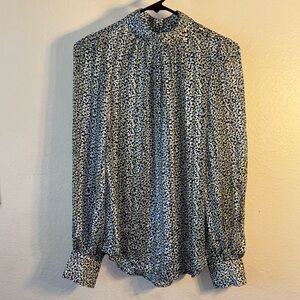 H & M blue and cream with yellow dots, shiny round cuff buttons on the back of t